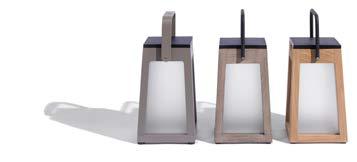 Three rectangular lanterns in gray, olive, and wood finishes are placed side by side on a white background, each with a handle on top.